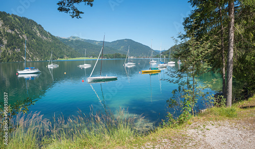 Fototapeta Naklejka Na Ścianę i Meble -  beautiful scenery at lake Achensee with moored sailboats. austrian landscape