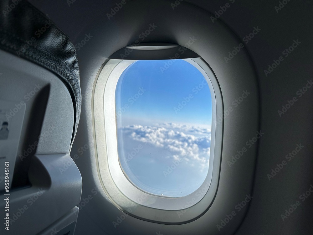 Naklejka premium Beautiful view through plane window during flight