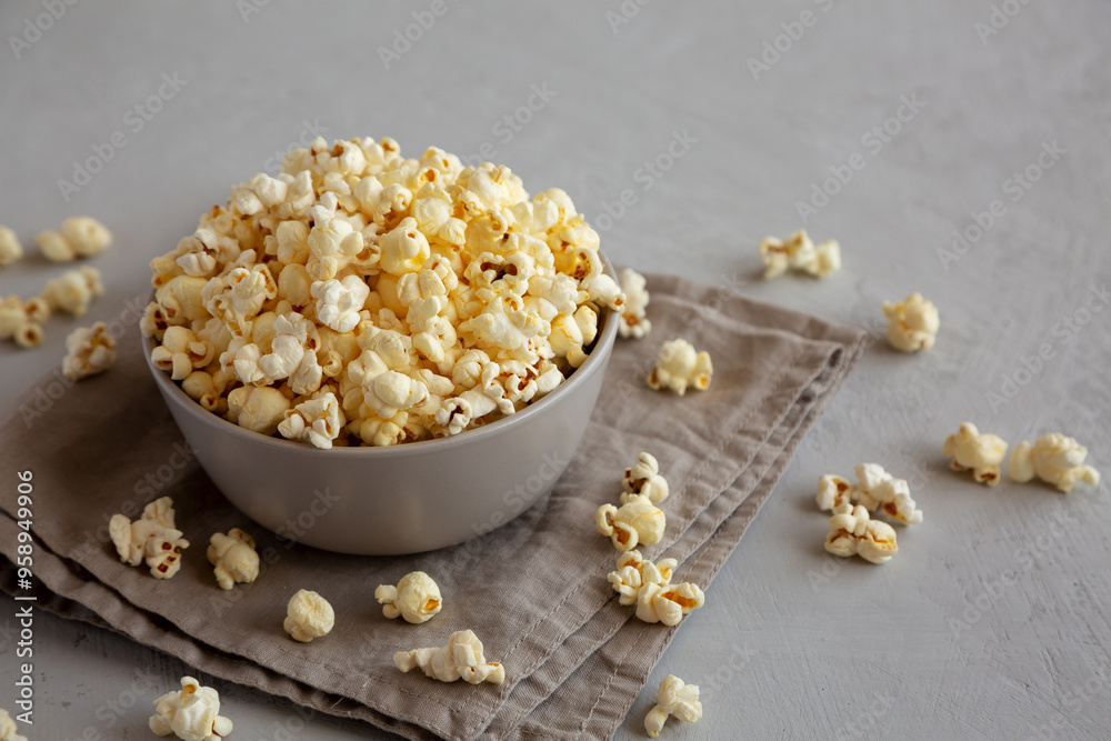Homemade Salty Popcorn in a Bowl, side view. Homemade Salty Popcorn in a Bowl, side view.
