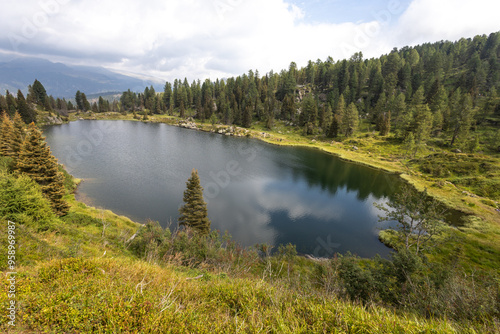 Colbricon Lake in Paneveggio Pale di San Martino Nature Park, Dolomites, Trentino Alto Adige, Italy photo