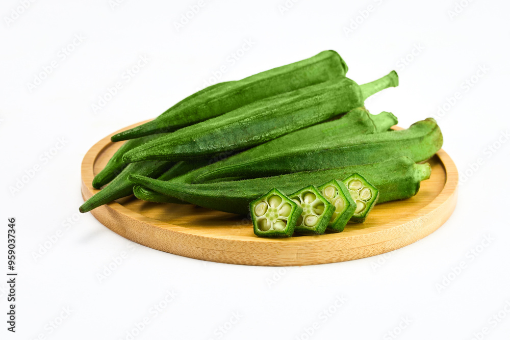 Fresh Okra on Wooden Board