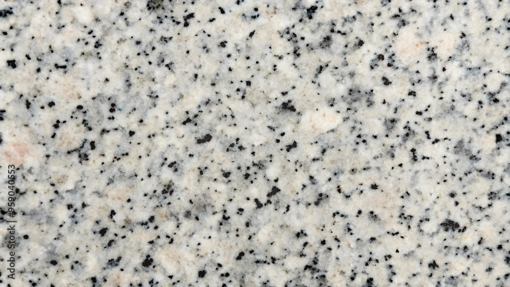 Speckled granite texture with light gray and black tones for contemporary design and decoration
