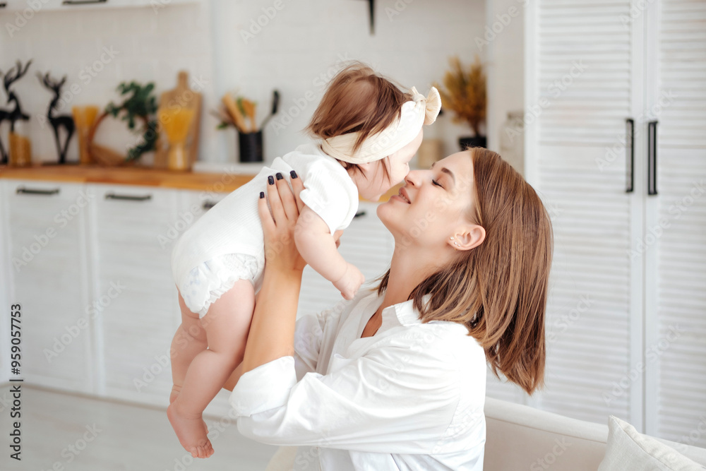 mom and baby, young mom playing and kissing a little child having fun with him and admiring him, happy motherhood mom and baby, young mom playing and kissing a little child having fun with him and admiring him, happy motherhood