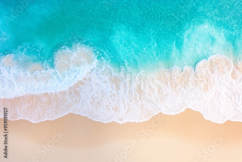 Stunning overhead shot of a tropical beach with crashing waves and golden sands.