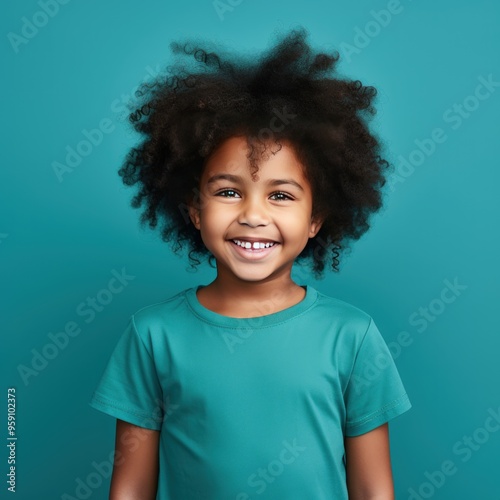 Turquoise background Happy black american african child Portrait of young beautiful kid Isolated on Background ethnic diversity equality acceptance 