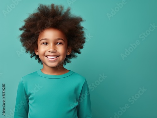 Turquoise background Happy european white child realistic person portrait of young beautiful Smiling child Isolated on Background Banner with copyspace blank