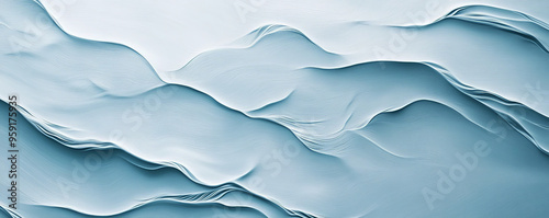 Wallpaper Mural A light blue textured surface featuring subtle wave-like patterns. The gentle hue and flowing texture evoke a calm and serene atmosphere, suitable for tranquil designs. Torontodigital.ca