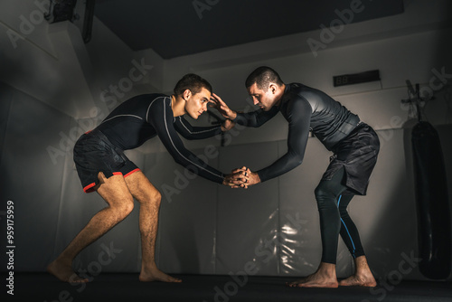 brazilian jiu jitsu bjj no gi grappling training two athletes practice photo