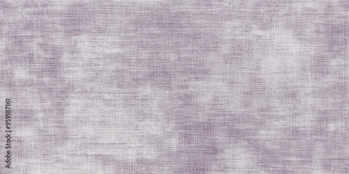 A light lavender-gray surface with a fine, linen-like texture. The soft tone and subtle texture provide a refined and sophisticated background.