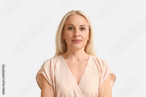 Mature blonde woman on ligh...