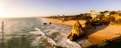 Sunset Splendor in Alvor: A Dreamlike View from Praia dos Tres Irmãos