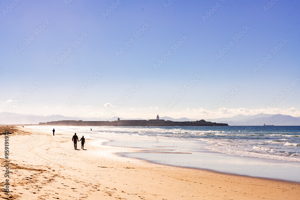 Romantic Sunset Stroll in Tarifa: Love on the Los Lances Beach Romantic Sunset Stroll in Tarifa: Love on the Los Lances Beach