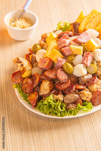 dish with onion, quail egg, pepperoni and cheese, meat
