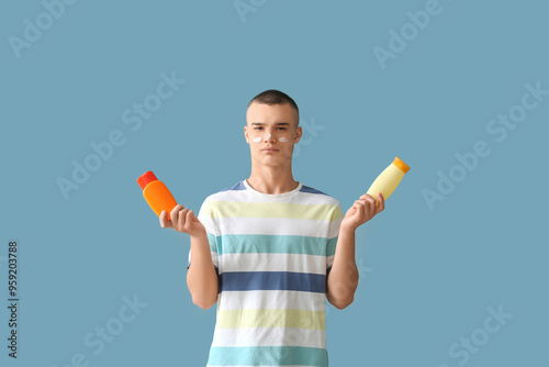 Confused young man with bot...