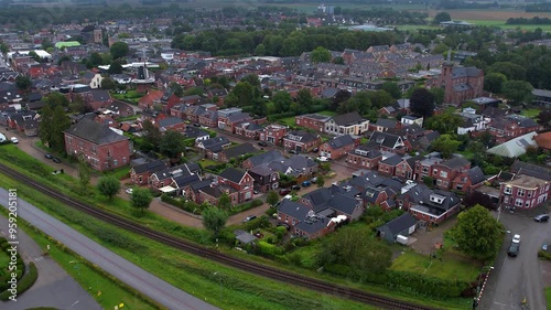 Aerial panorama of the city Uithuizen in the Netherlands on a cloudy morning in summer photo