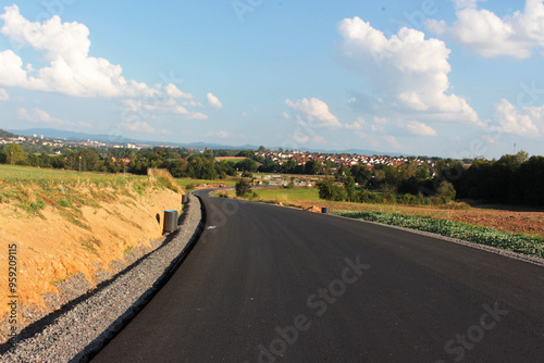 An image of the construction of a new paved road.