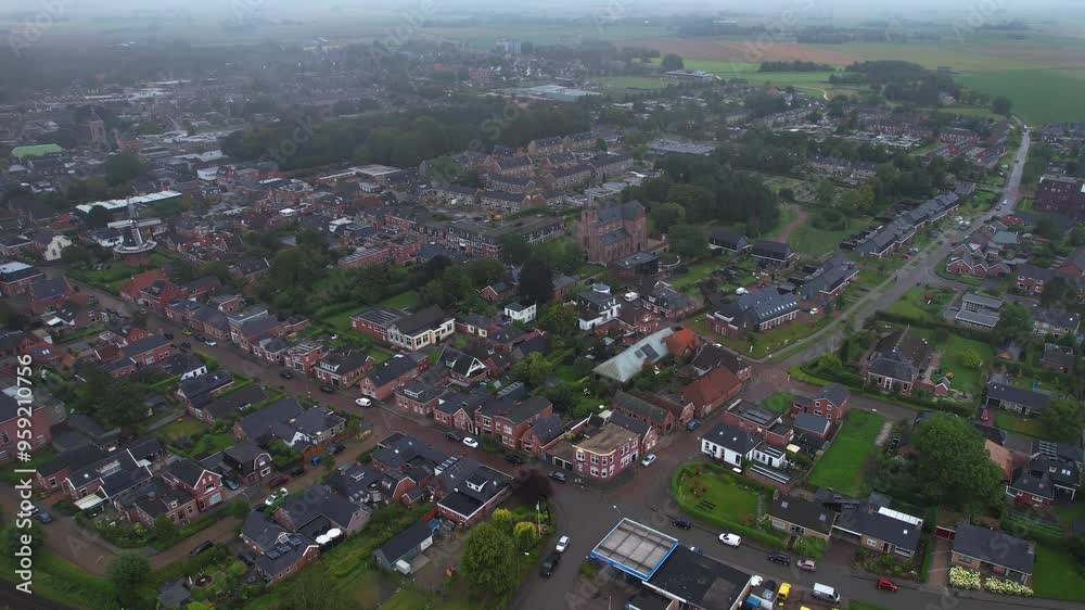 Aerial panorama of the city Uithuizen in the Netherlands on a cloudy morning in summer Aerial panorama of the city Uithuizen in the Netherlands on a cloudy morning in summer