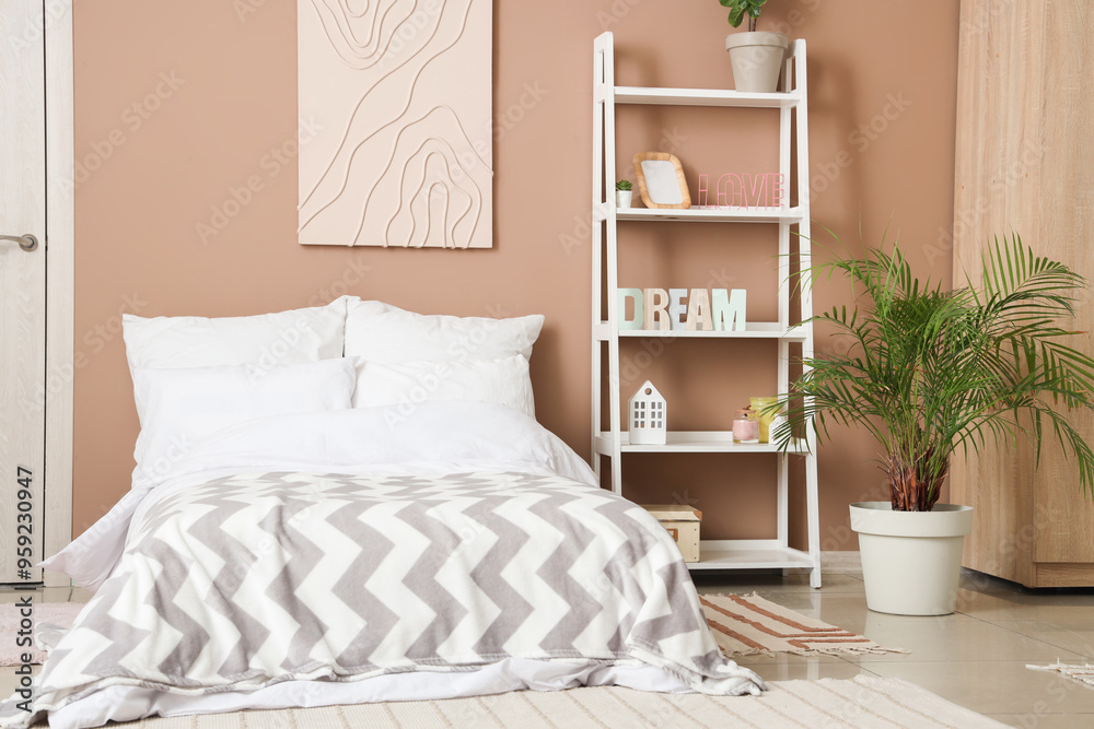 Φωτογραφία Interior of teenager's room with bed and shelf unit