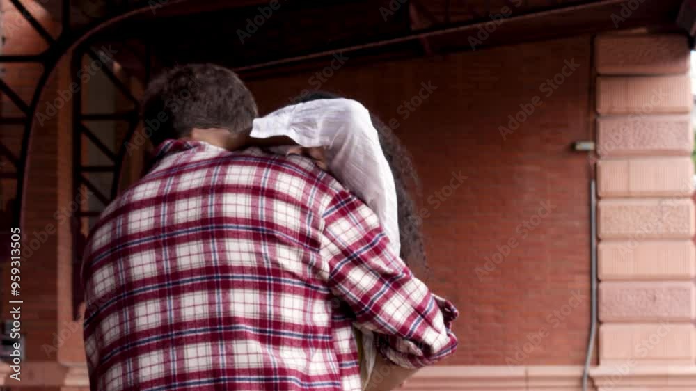 Reunited at last!: Young couple meeting at the station after a trip Reunited at last!: Young couple meeting at the station after a trip