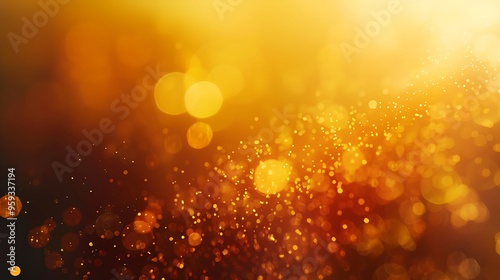 A blurred background with a rich, colorful gradient in warm gold and amber shades