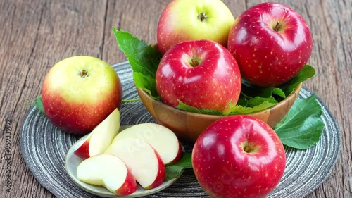 Fresh Red Japanese Apple in wooden bowl on wooden background, Shinano Red and Sansa  Apple in wooden basket