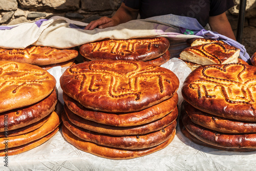 Armenia, Ararat Province, Goght. Ornately decorated Gata (sweet bread) for sale. photo