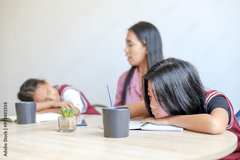 Lazy Asian Daughters Learning With Writing On Book Doing Homework And Mother Supporting Daughter Lazy Asian Daughters Learning With Writing On Book Doing Homework And Mother Supporting Daughter