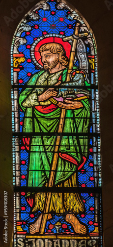 Saint John stained glass, Lyon Cathedral, France. Cathedral begun in 1180 and finished in 1480. photo