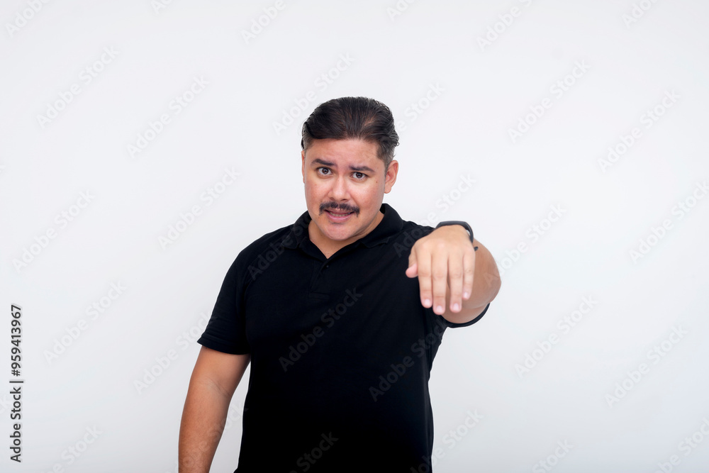 A straightforward middle aged man telling someone to leave immediately, shooing away with his hand. Set against a white background.