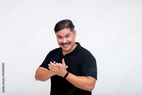 Obraz na plátne A scheming man with a wicked grin rubbing his hands, relishing a plan coming into fruition