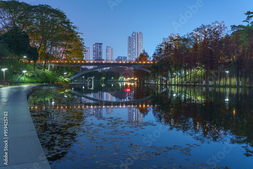 A grove of larch trees along the lake in City Park