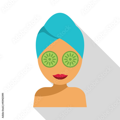 Woman with a blue towel on her head enjoying a cucumber face treatment