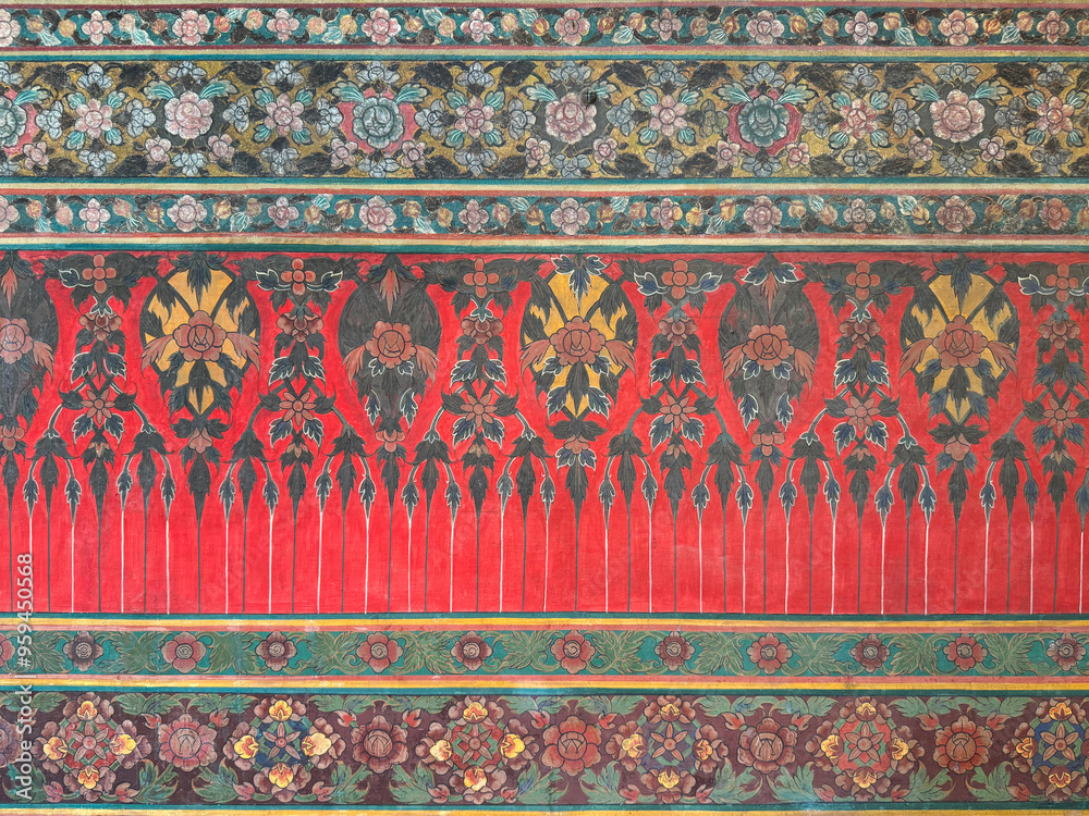 Close up of Thailand temple engraving and mural art pattern on wall, in different shapes, forms, and carved in every details, in various paint colors. Seamless background texture. Close up of Thailand temple engraving and mural art pattern on wall, in different shapes, forms, and carved in every details, in various paint colors. Seamless background texture.