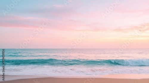 Calm Ocean Waves at Sunset with Pink Sky and Sandy Beach