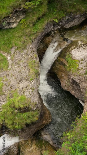 Vertical View Of Kuhflucht Waterfalls In Walderlebnispfad Farchant Hiking Trails In Germany. Aerial Shot photo