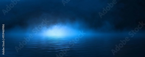 Dark blue background with a foggy surface of water reflecting a light source in the distance.