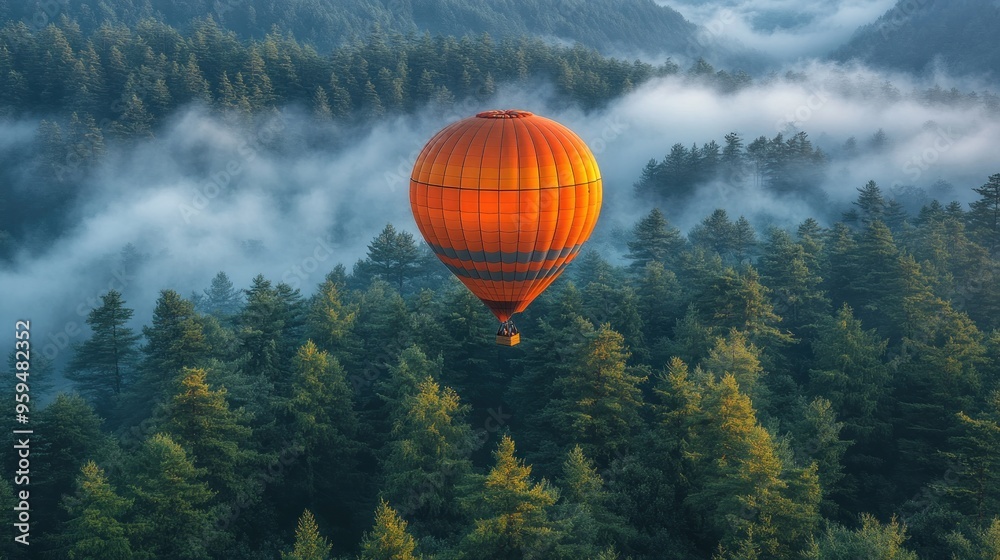 A vibrant hot air balloon floats over misty forests. A vibrant hot air balloon floats over misty forests.