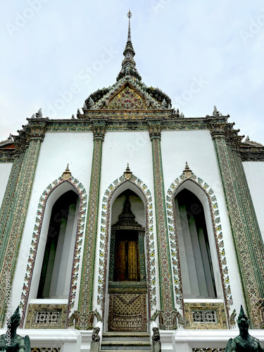 The Royal Hall of Piman Rattaya, one of the main gate at The Grand Palace Thailand, Bangkok. Unique Thailand culture with royal Buddhist elements and engravings on the wall photo