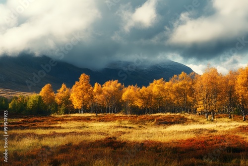 Golden autumn trees against a dramatic sky in a mountain landscape. Generative AI