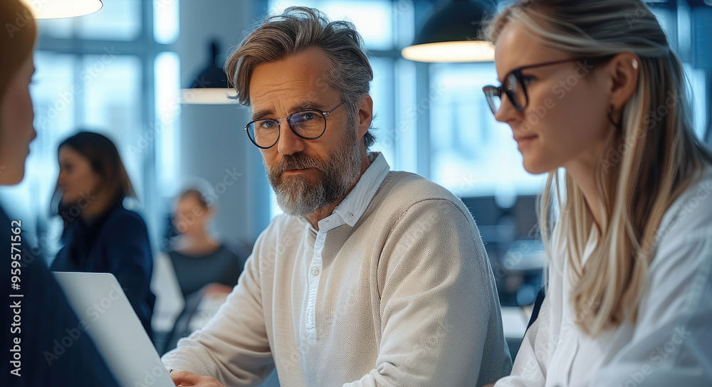 A diverse group of professionals gathered around an open desk, working together on an IT project in the office. Generative AI. A diverse group of professionals gathered around an open desk, working together on an IT project in the office. Generative AI.