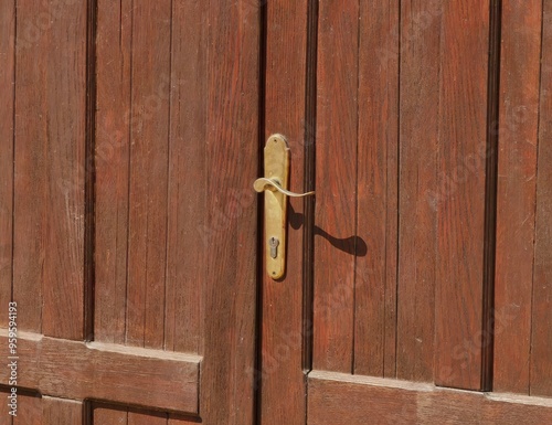 Closed Wooden Door Frame: Detail of Light and Shadow photo