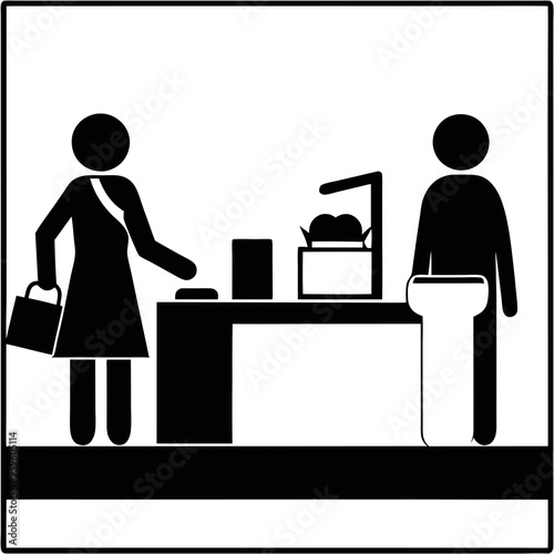 A cashier assists a customer at a checkout counter, with a bag in hand and groceries on display