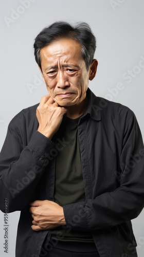 White background sad Asian man. Portrait of older mid-aged person beautiful bad mood expression boy Isolated on Background depression anxiety fear burn out