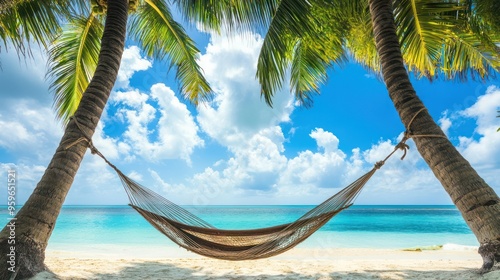 Relaxing Hammock Under Palm Trees on a Tropical Beach