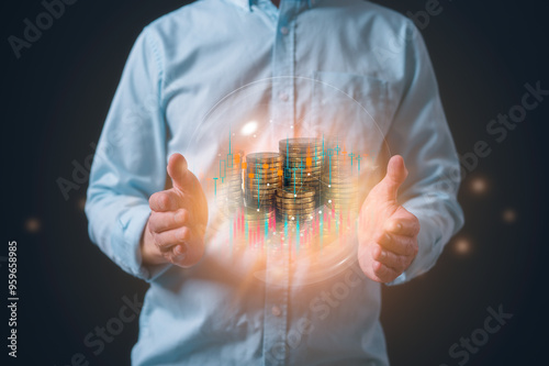 investment and finance concept, businessman holding virtual trading graph and blurred coins on hand, stock market, profits and business growth photo