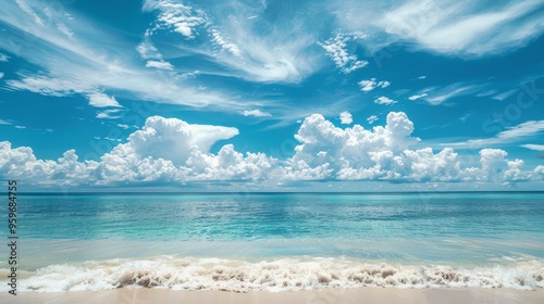 Beautiful tropical empty beach sea ocean with white cloud on blue sky background