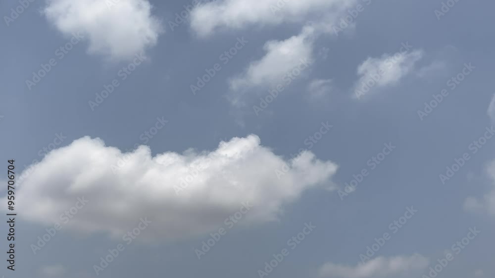 Timelapse of blue Sky with Fast moving white fluffy cloud Timelapse of blue Sky with Fast moving white fluffy cloud
