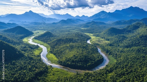 Aerial shot of the forested mountains and winding rivers of the Nam Et-Phou Louey National Biodiversity Conservation Area.