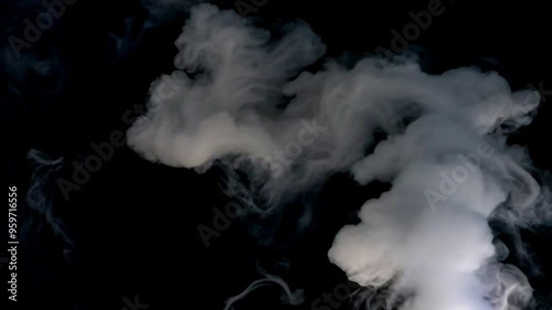Swirling smoke over a black background, creating an abstract dark texture with fog or steam-like patterns