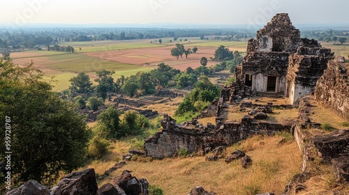 Top view of Phnom Chisor, with its ancient ruins perched on a hilltop offering panoramic views of the fields below. photo